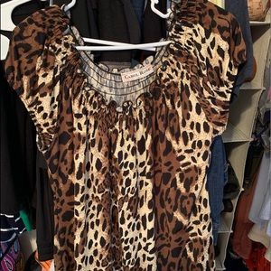 Cheetah shirt.